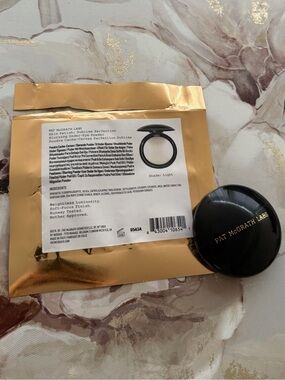 PAT MCGRATH LABS
Skin Fetish: Sublime Perfection Blurring Under
Eye Powder